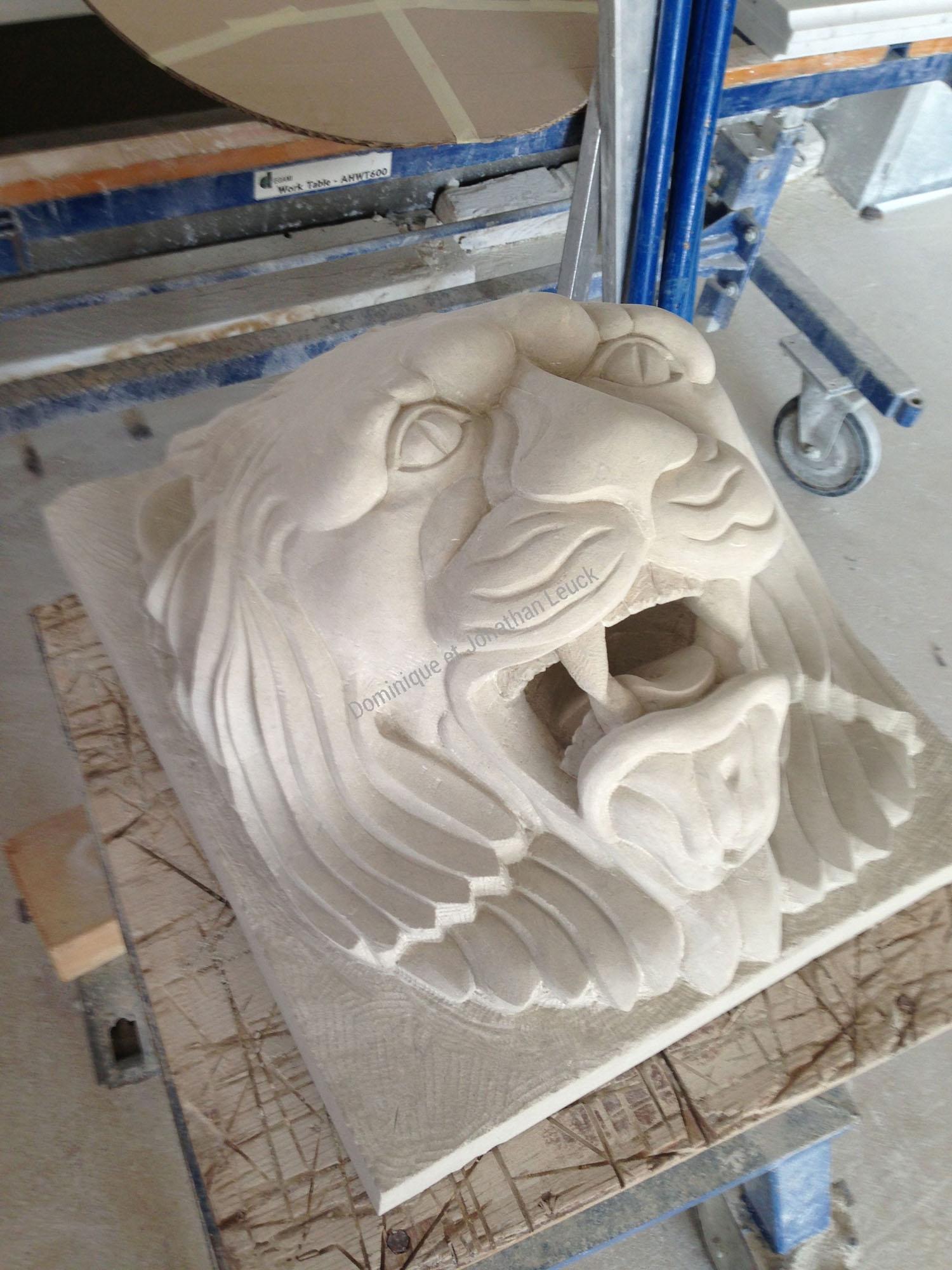 Sculpture tête de lion
